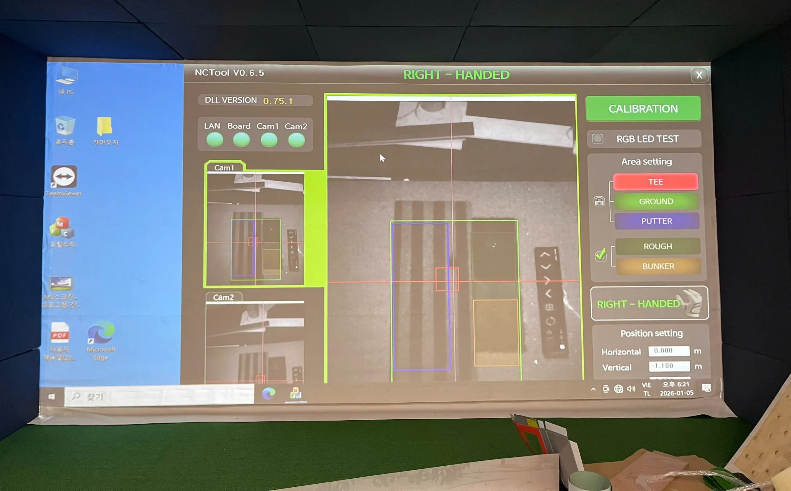 Chất lượng hình ảnh sắc nét, độ sáng cao của BenQ AK700ST trong quá trình test thực tế, hiển thị chi tiết địa hình sân golf và vùng đánh, đáp ứng tốt yêu cầu tập luyện.